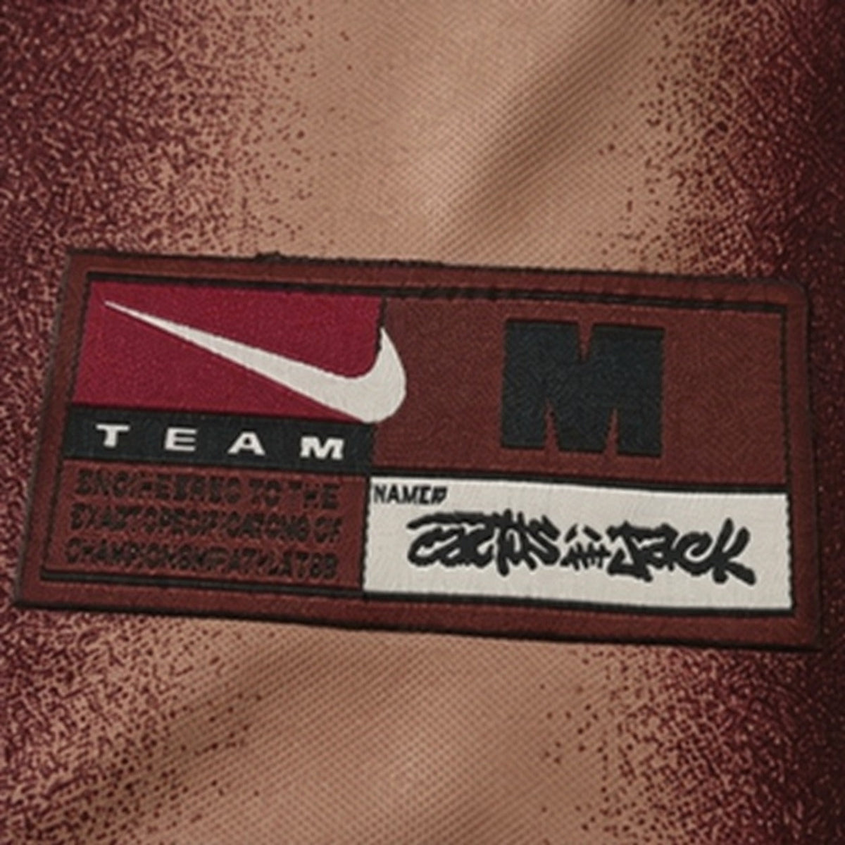USA I Cactus Jack Total 90 Retro Trikot - Detail des Saumetiketts