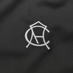 Club America 2026/27 women away jersey - historic crest and charcoal fabric macro detail