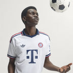 Bayern Munich 2026/27 away player jersey, KANE 9 - front three-quarter view of the base shirt worn by a model