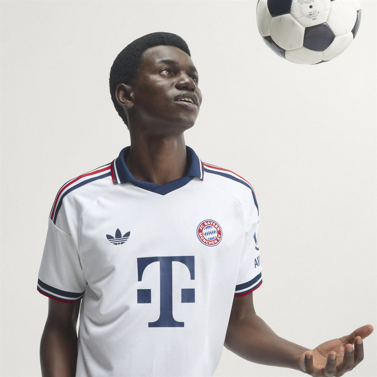 Bayern Munich 2026/27 away player jersey, KANE 9 - front three-quarter view of the base shirt worn by a model