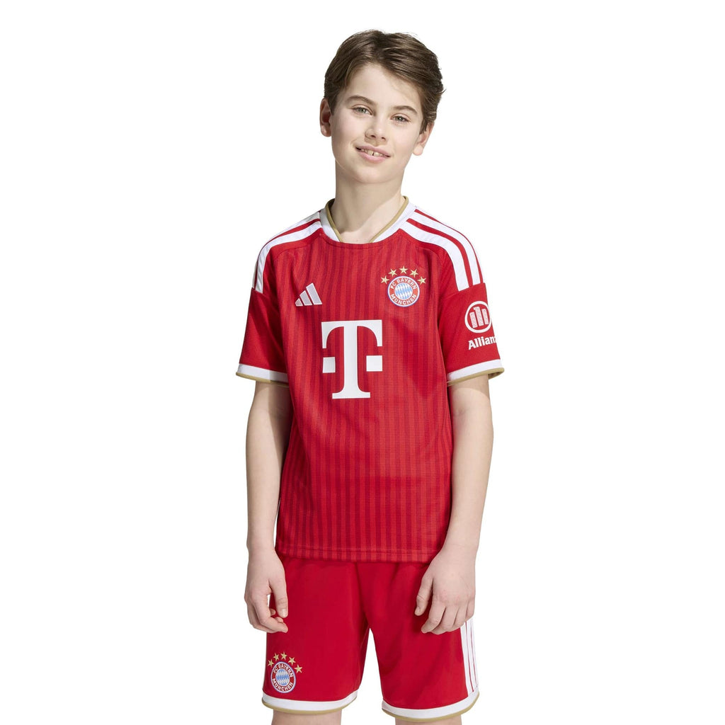 Bayern Munich 2026/27 home kids kit, KANE 9 - front view of the base shirt worn by a model