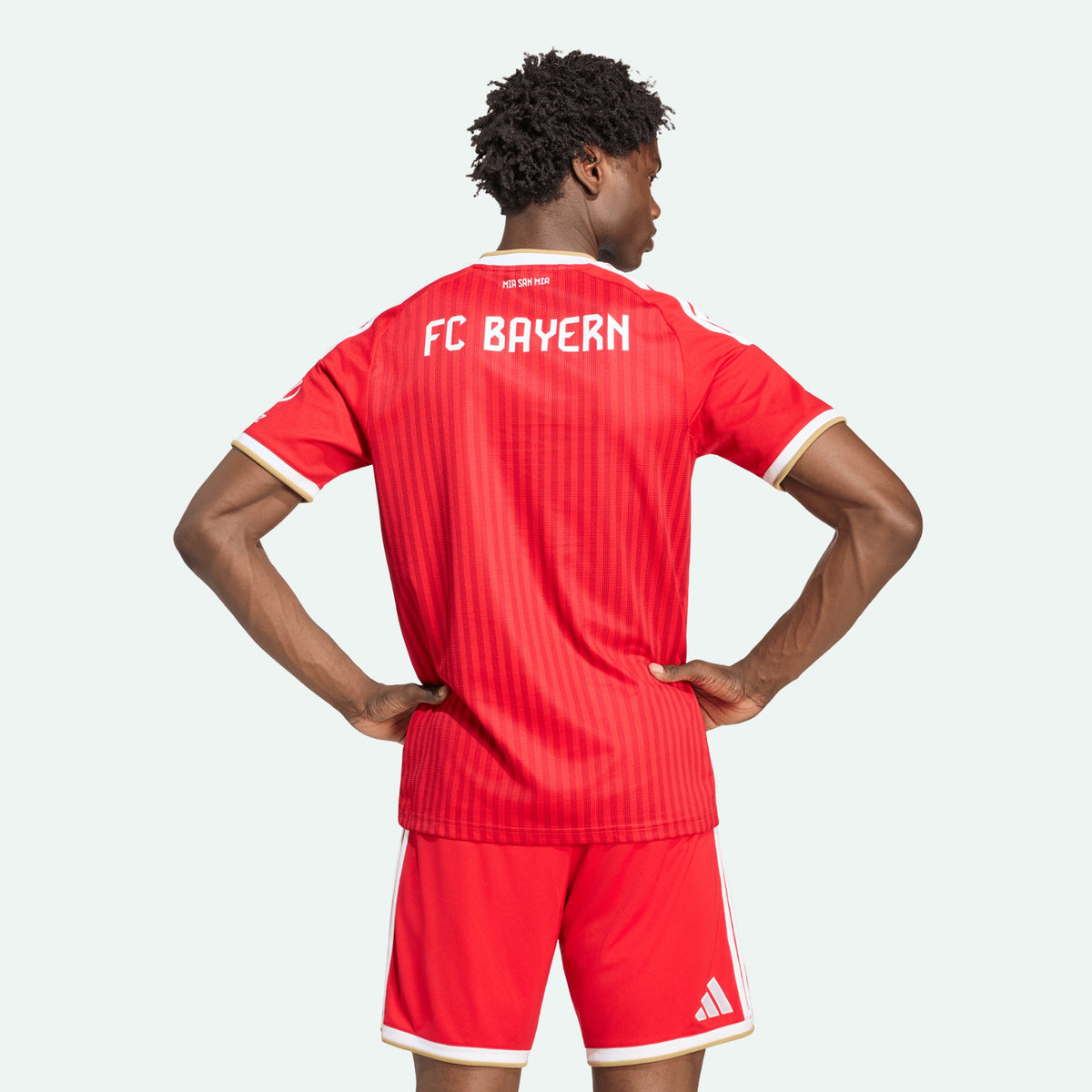 Bayern Munich 2026/27 home fan shirt, KANE 9 - back view of the base shirt worn by a model