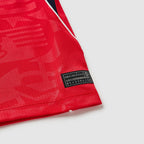 England 2026 away kids kit, KANE 9 - shirt hem and performance label detail