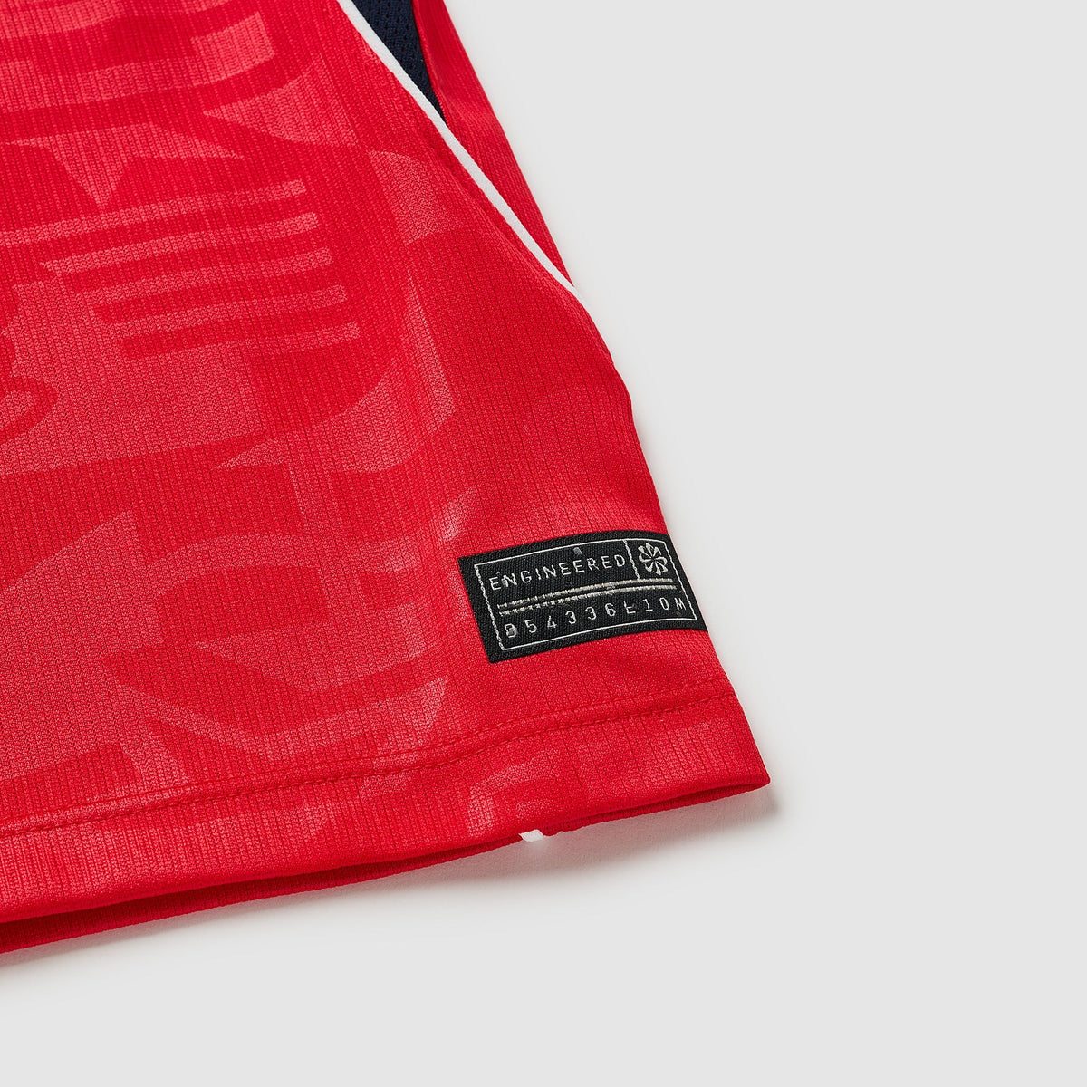 England 2026 away kids kit, KANE 9 - shirt hem and performance label detail