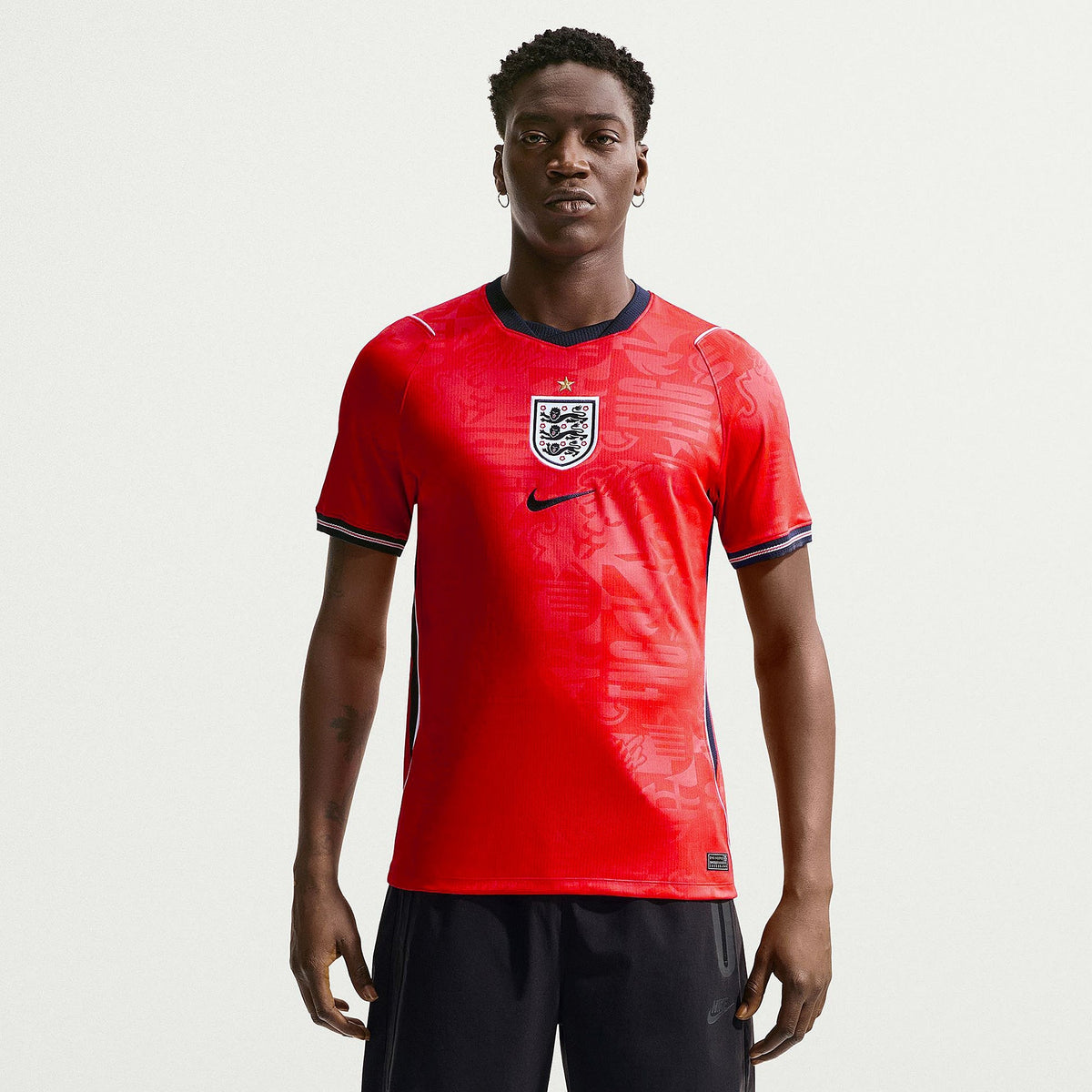 England 2026 away fan shirt, KANE 9 - front view of the base shirt worn by a model