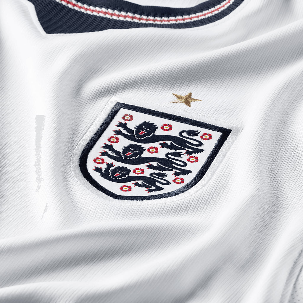 England 2026 home women's shirt, KANE 9 - crest and shirt fabric detail